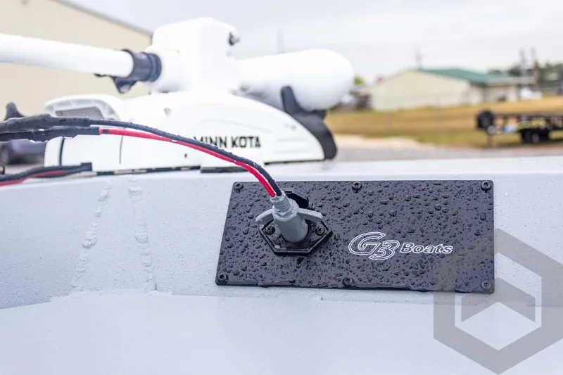 Slide: The Image of 2026 G3 Bay 20 boat with Minn Kota motor, featuring G3 Boats logo and wet surface. - 26