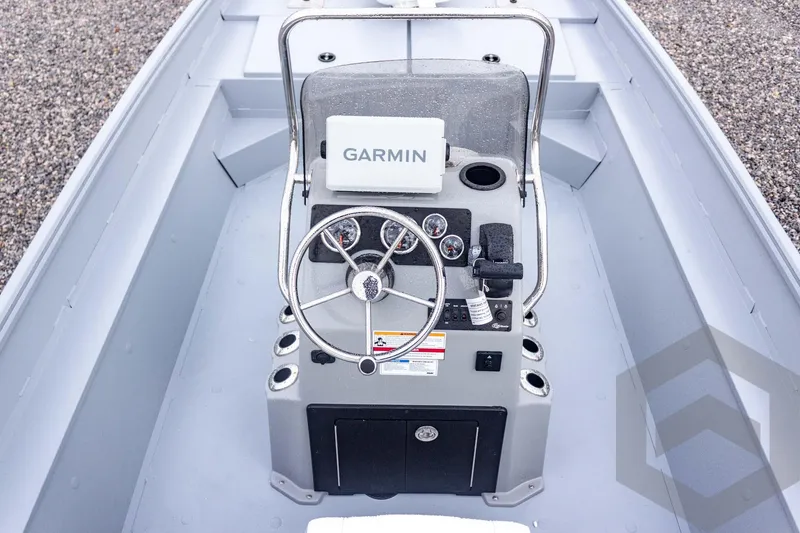 Slide: The Image of 2026 G3 Bay 20 boat console with Garmin navigation system and steering wheel. - 31