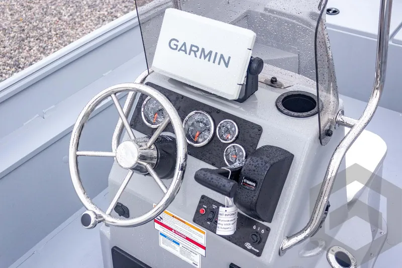 Slide: The Image of Steering console of 2026 G3 Bay 20 boat with Garmin navigation system. - 32