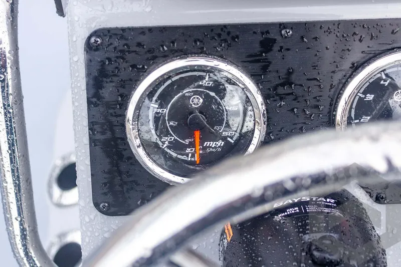 Slide: The Image of Close-up of 2026 G3 Bay 20 boat dashboard with raindrops on speedometer. - 34
