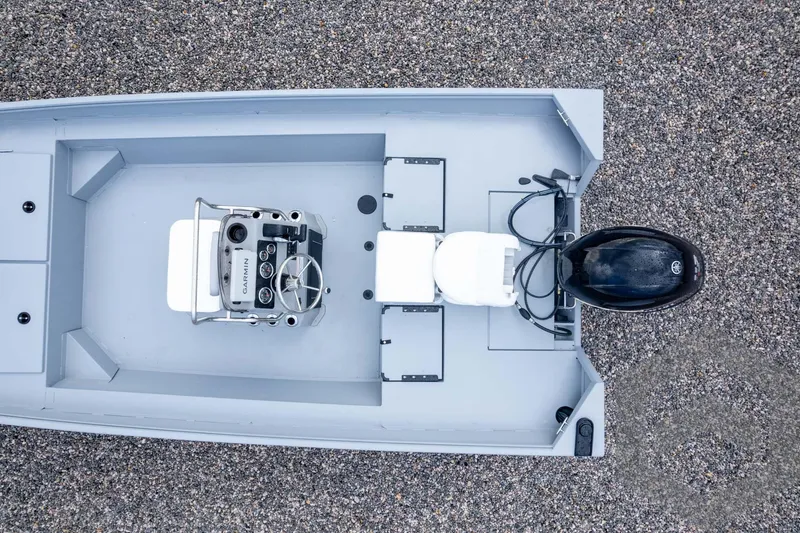 Slide: The Image of Top view of 2026 G3 Bay 20 boat with Garmin console and outboard motor. - 40