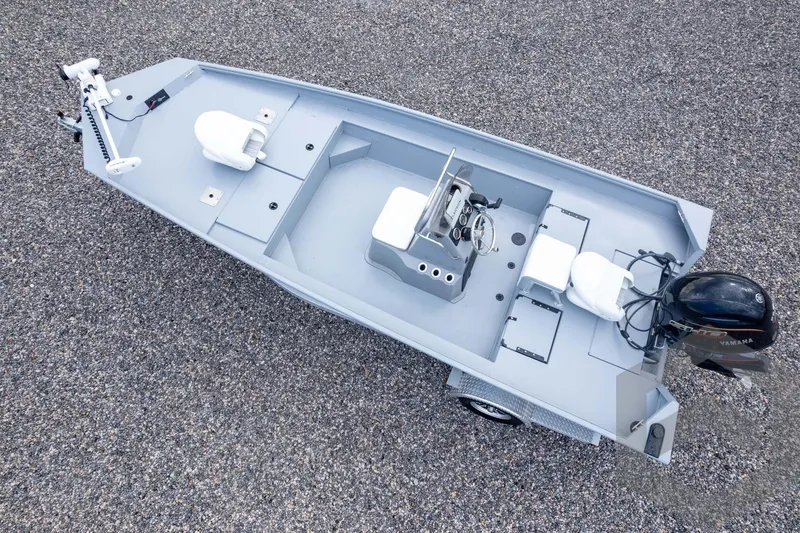 Slide: The Image of 2026 G3 Bay 20 boat, aerial view, featuring sleek design and modern outboard motor. - 44