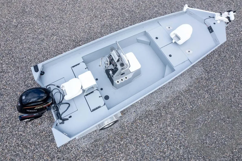 Slide: The Image of 2026 G3 Bay 20 boat with Yamaha motor, aerial view on gravel surface. - 46