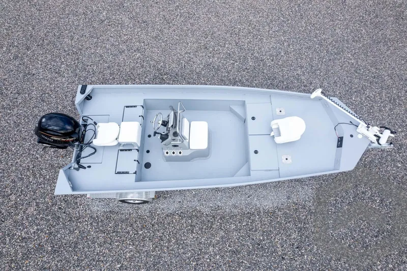 Slide: The Image of 2026 G3 Bay 20 boat, aerial view, featuring sleek design and modern outboard motor. - 47