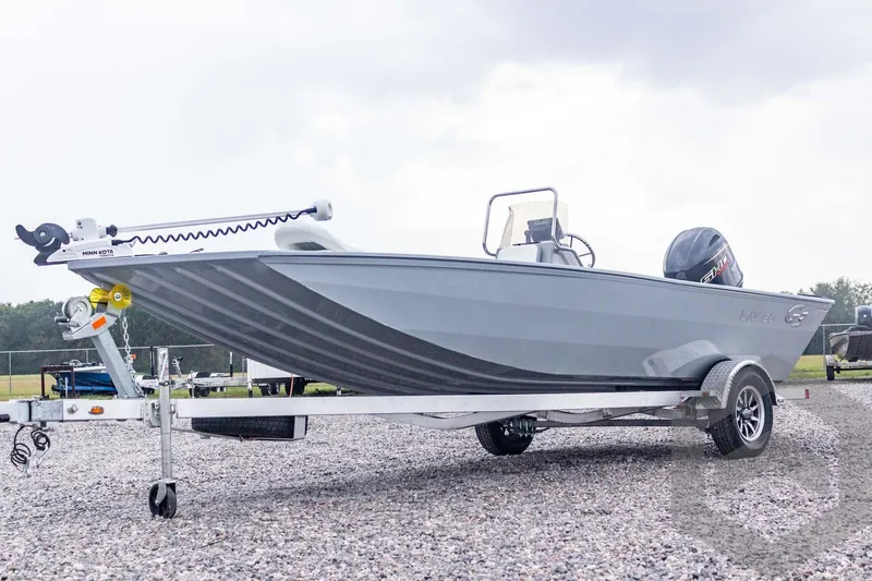 Slide: The Image of 2026 G3 Bay 20 boat on trailer, featuring Minn Kota motor, parked on gravel. - 5