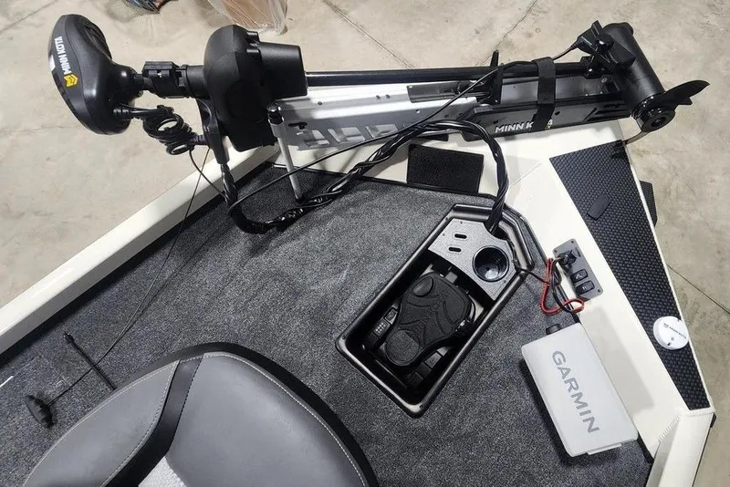 Slide: The Image of 2026 Ranger RT178 boat deck with Minn Kota trolling motor and Garmin electronics. - 3