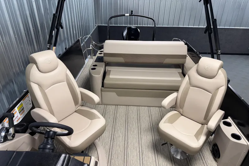 Slide: The Image of Luxurious interior of 2026 Premier 230 Sunsation RL Tritoon with plush seating and modern design. - 21