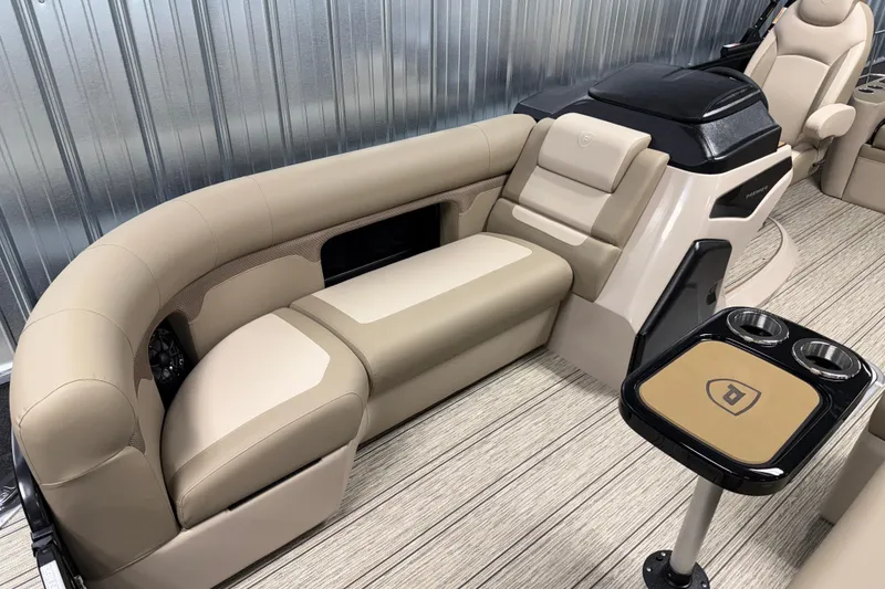 Slide: The Image of Luxurious seating on 2026 Premier 230 Sunsation RL Tritoon with cup holders and modern design. - 24