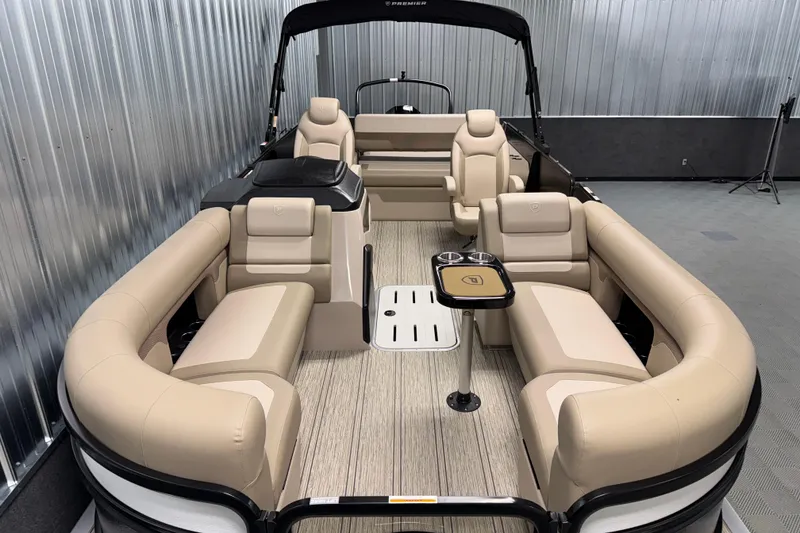 Slide: The Image of 2026 Premier 230 Sunsation RL Tritoon with luxurious beige seating and modern design. - 8
