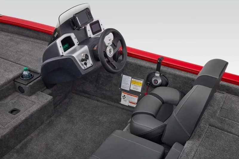 Slide: The Image of 2026 Tracker Pro Team 190 boat interior with steering console and seating. - 7