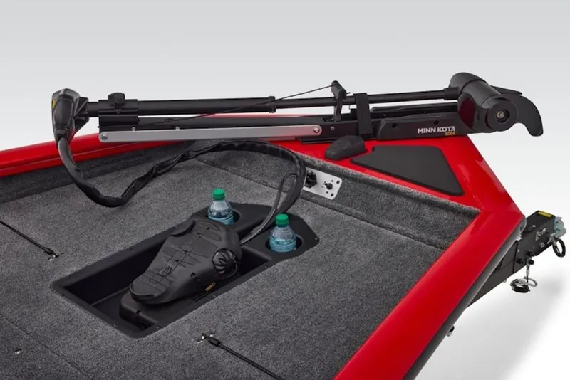 Slide: The Image of 2026 Tracker Pro Team 190 boat deck with Minn Kota trolling motor and storage compartment. - 9