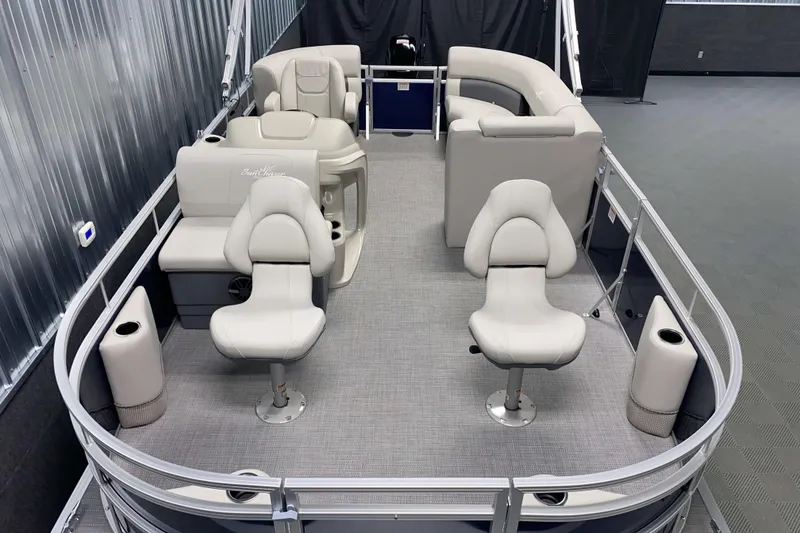 Slide: The Image of 2026 SunChaser Vista 18 Fish pontoon boat interior with plush seating and modern design. - 1