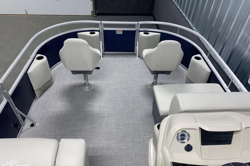 Slide: The Image of 2026 SunChaser Vista 18 Fish boat interior with seating and steering console. - 10