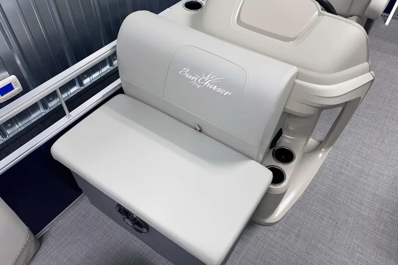 Slide: The Image of 2026 SunChaser Vista 18 Fish boat seat with logo, cup holders, and modern design. - 11