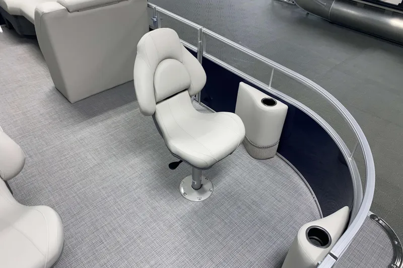 Slide: The Image of 2026 SunChaser Vista 18 Fish boat interior with swivel seat and cup holders. - 13