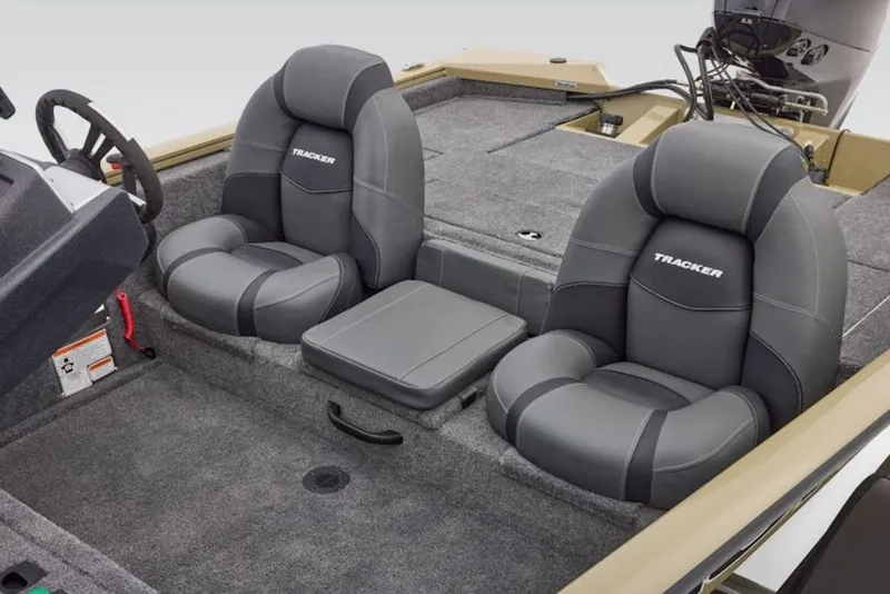 Slide: The Image of 2026 Tracker Pro Team 175 boat interior with gray cushioned seats and steering wheel. - 12