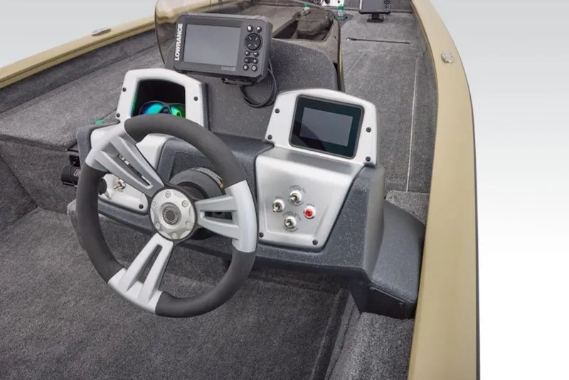 Slide: The Image of 2026 Tracker Pro Team 175 boat dashboard with steering wheel and electronic displays. - 4