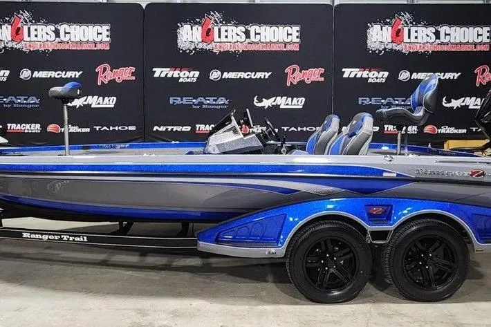 The Image of 2025 Ranger Z520R Cup-Equipped boat in blue and gray, showcased at Anglers Choice event. - 1