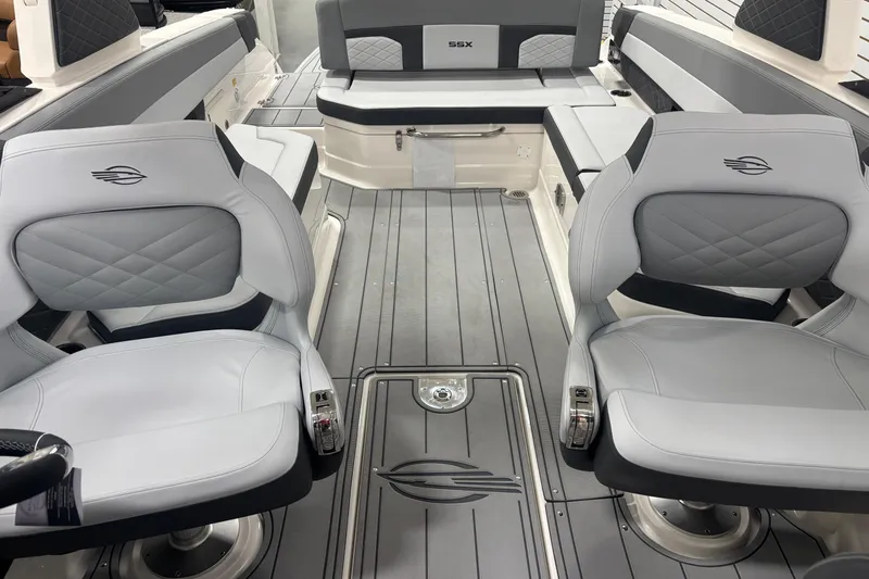 Slide: The Image of 2026 Chaparral SSX 30 boat interior with luxurious seating and modern design. - 13