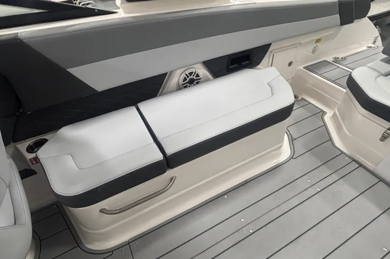 Slide: The Image of 2026 Chaparral SSX 30 boat interior with gray seating and flooring. - 16