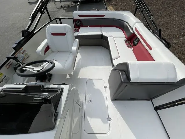 Slide: The Image of 2023 Hurricane FunDeck 1960 REF OB boat interior with white and red seating. - 8