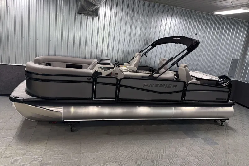 The Image of 2026 Premier 230 Sunsation Angler 2pt Tritoon in showroom, side view. - 0