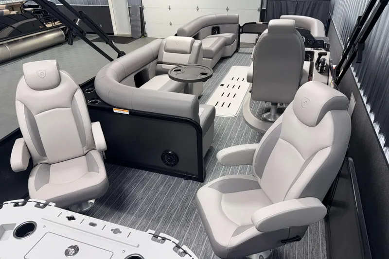 Slide: The Image of 2026 Premier 230 Sunsation Angler Tritoon interior with luxurious seating and modern design. - 11
