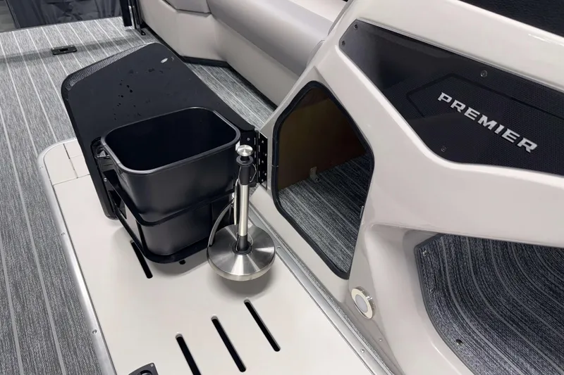 Slide: The Image of 2026 Premier 230 Sunsation Angler Tritoon interior with storage and sleek design. - 20