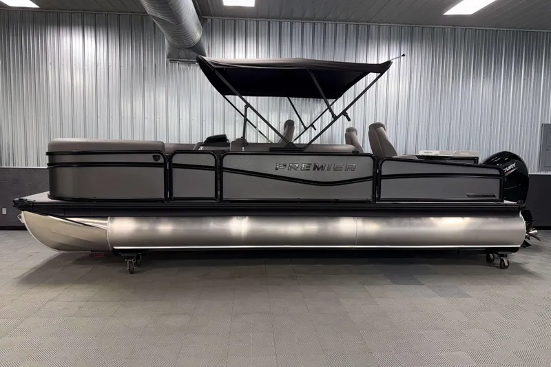 Slide: The Image of 2026 Premier 230 Sunsation Angler 2pt Tritoon in showroom, side view. - 3