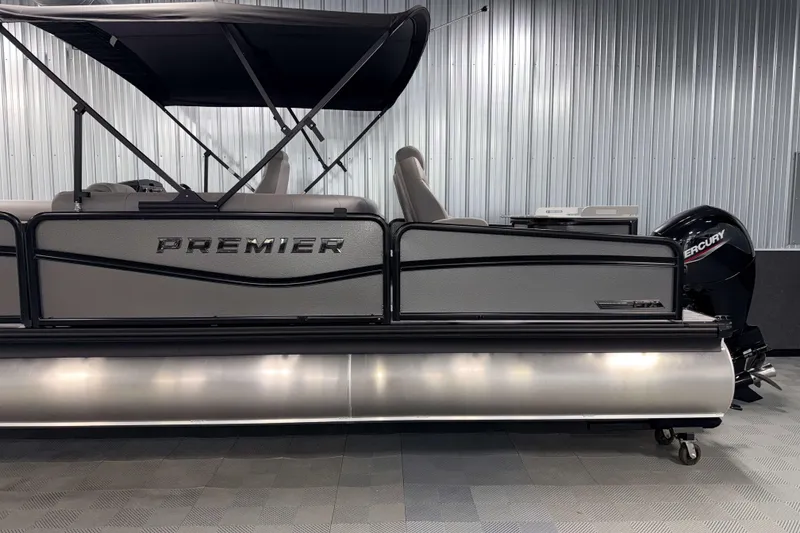 Slide: The Image of 2026 Premier 230 Sunsation Angler 2pt Tritoon with Mercury engine in showroom. - 5