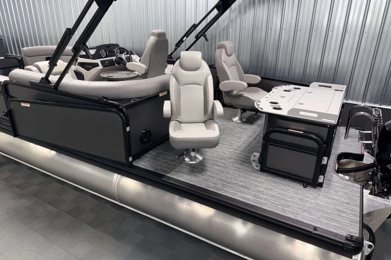 Slide: The Image of 2026 Premier 230 Sunsation Angler Tritoon with luxurious seating and fishing station. - 7
