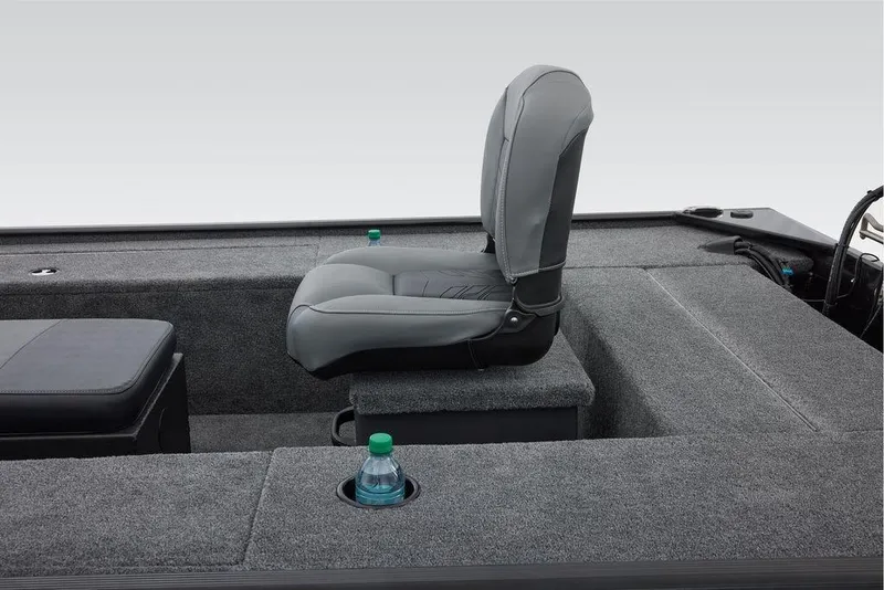 Slide: The Image of 2026 Tracker Panfish 17 boat interior with gray seating and cup holders. - 11