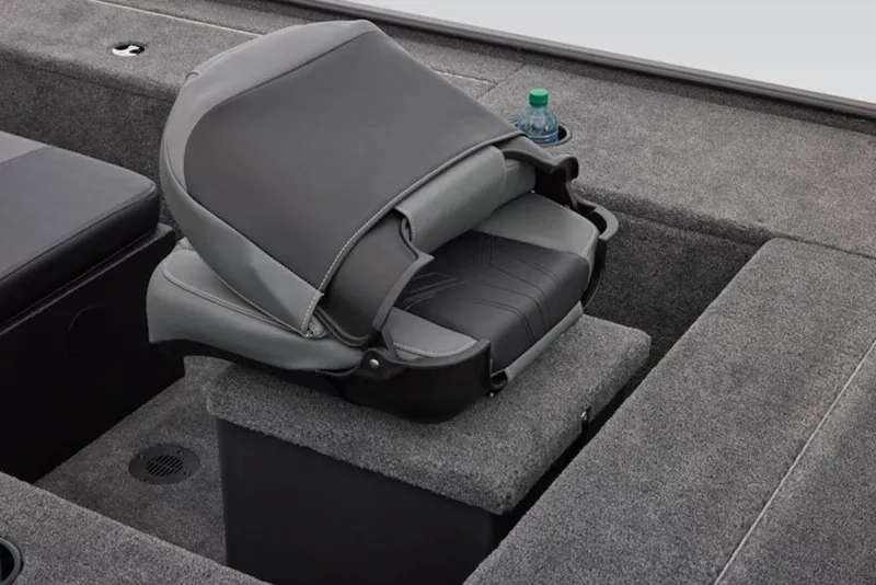 Slide: The Image of 2026 Tracker Panfish 17 boat interior with cushioned seat and cup holder. - 14