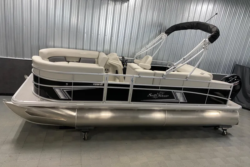 The Image of 2026 SunChaser Vista 20 CRB pontoon boat in a showroom setting. - 0