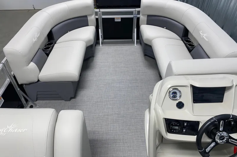 Slide: The Image of Luxurious interior of 2026 SunChaser Vista 20 CRB pontoon boat with plush seating. - 10