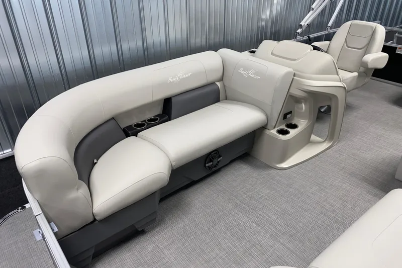 Slide: The Image of 2026 SunChaser Vista 20 CRB boat interior with plush seating and cup holders. - 12
