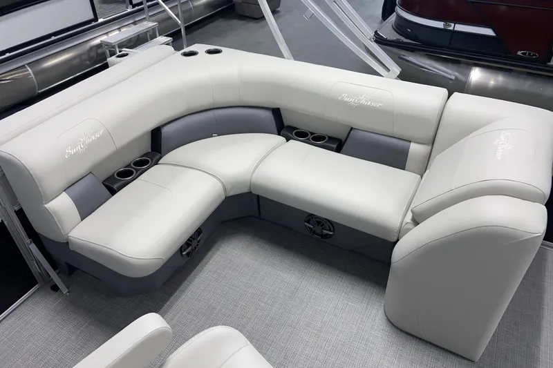 Slide: The Image of Luxurious seating on 2026 SunChaser Vista 20 CRB pontoon boat, featuring plush white upholstery. - 3