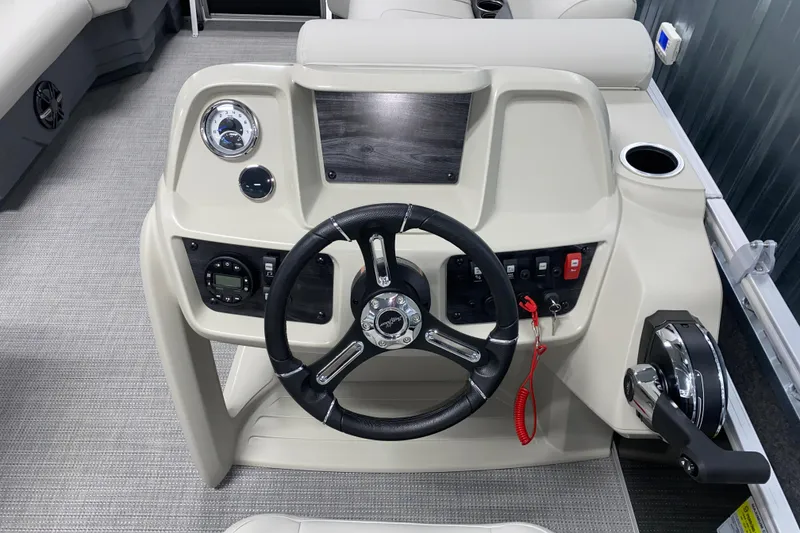 Slide: The Image of Steering console of 2026 SunChaser Vista 20 CRB pontoon boat, featuring modern controls and dashboard. - 8