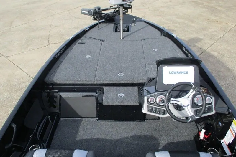 Slide: The Image of 2026 Ranger Z185 boat interior with steering wheel and Lowrance display. - 3