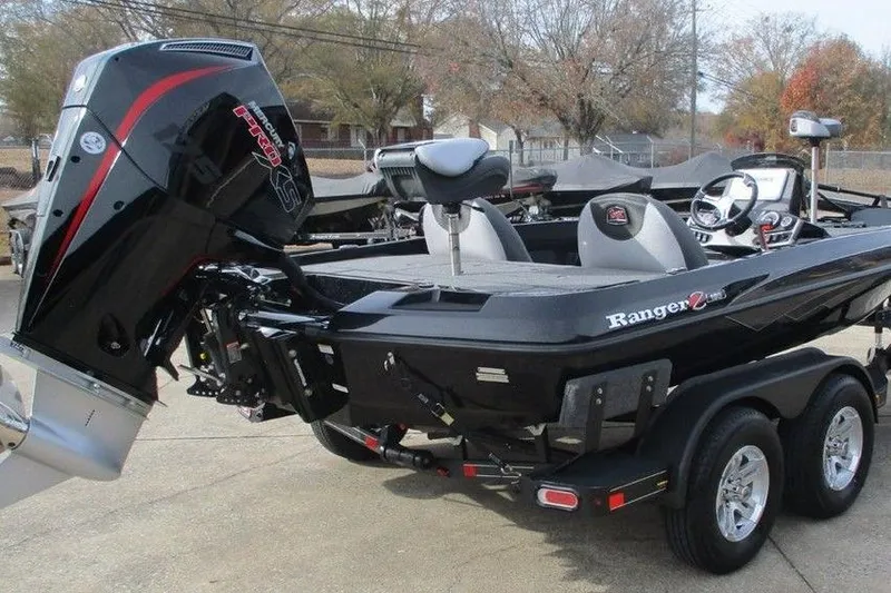 Slide: The Image of 2026 Ranger Z185 boat with powerful outboard motor on a trailer. - 4