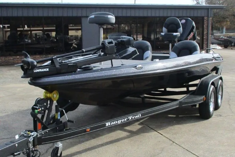 Slide: The Image of 2026 Ranger Z185 boat on trailer, featuring Lowrance equipment, parked outdoors. - 5