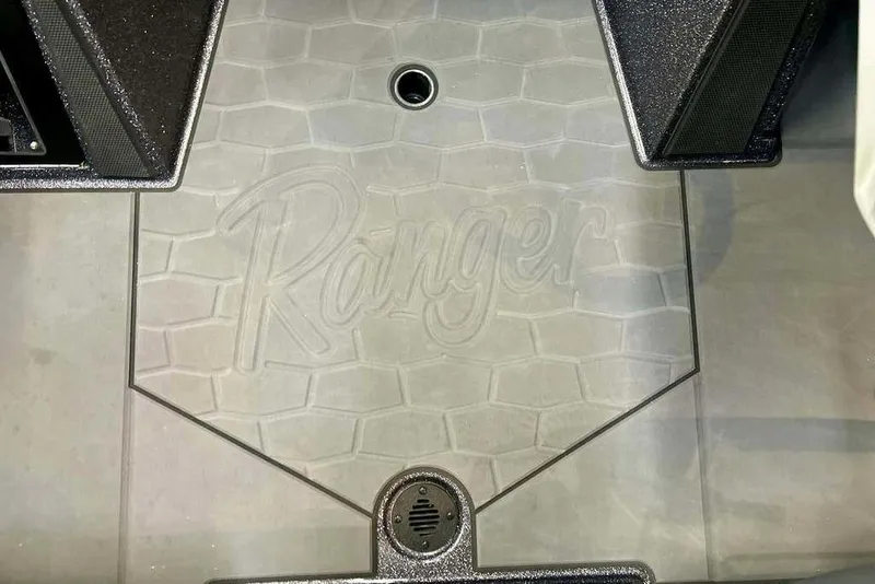 Slide: The Image of Ranger Z521R Cup-Equipped 2026 boat floor with logo and textured design. - 11