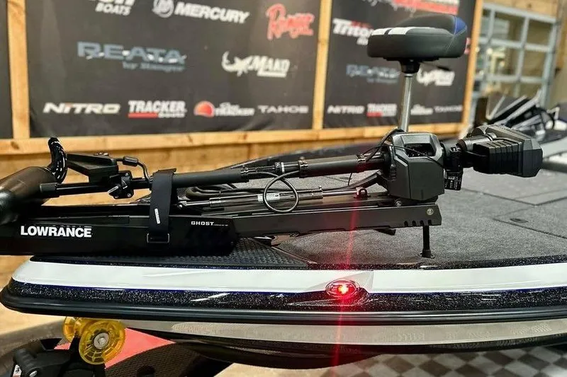 Slide: The Image of 2026 Ranger Z521R Cup-Equipped boat with Lowrance Ghost trolling motor in showroom. - 15