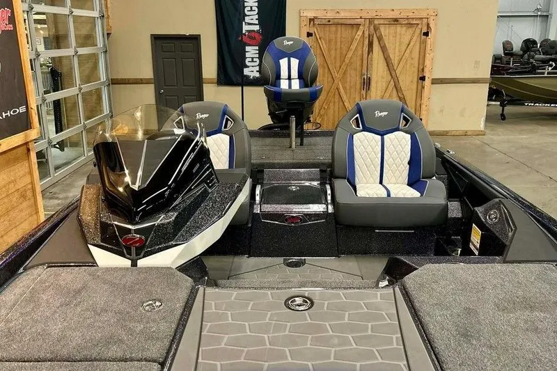 Slide: The Image of 2026 Ranger Z521R Cup-Equipped boat interior with stylish seating and modern dashboard. - 16