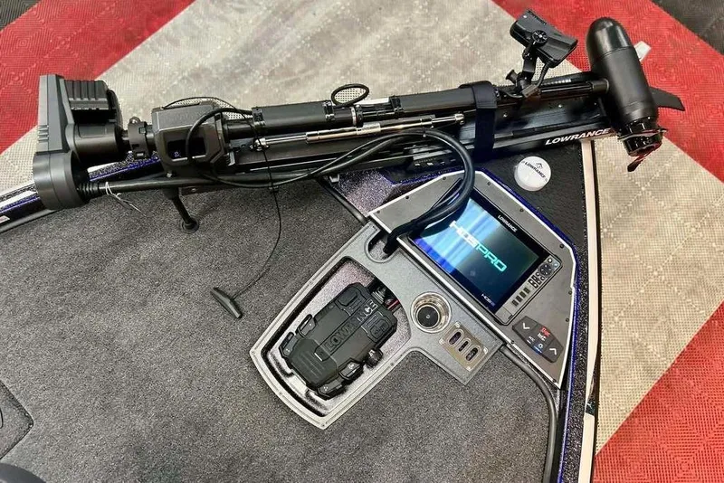 Slide: The Image of 2026 Ranger Z521R Cup-Equipped boat dashboard with Lowrance electronics and trolling motor. - 3