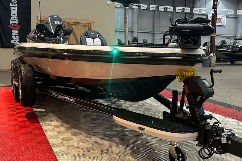 Slide: The Image of 2026 Ranger Z521R Cup-Equipped boat on display in showroom with trailer. - 4