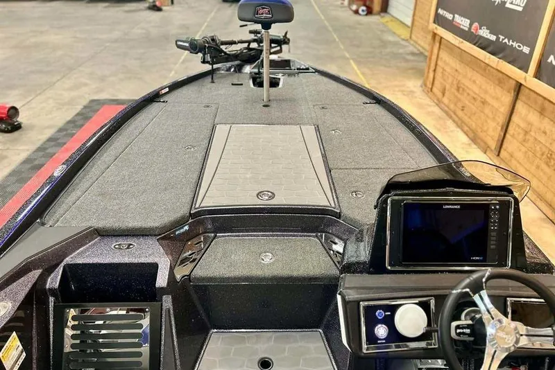 Slide: The Image of 2026 Ranger Z521R Cup-Equipped boat interior with advanced navigation system and spacious deck. - 6