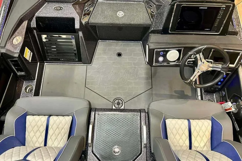 Slide: The Image of 2026 Ranger Z521R Cup-Equipped boat interior with modern dashboard and dual seats. - 7