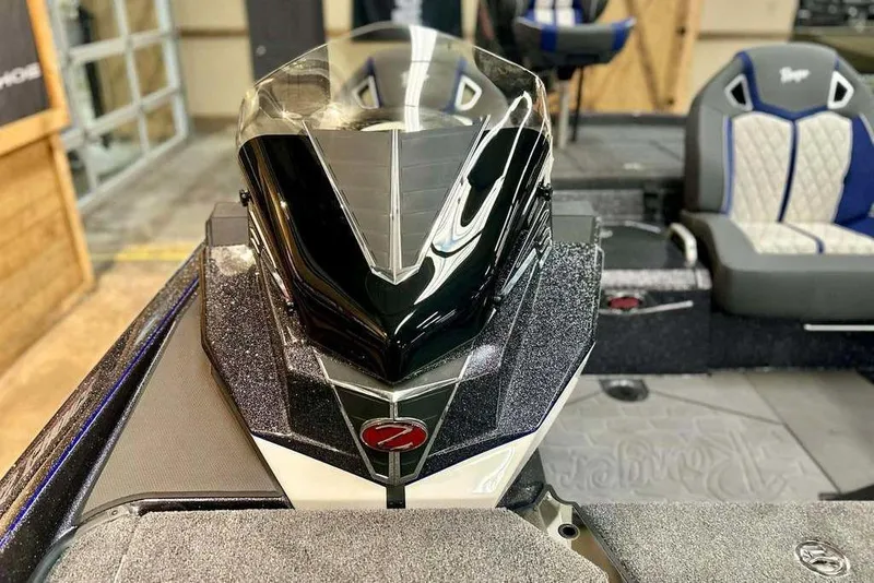 Slide: The Image of 2026 Ranger Z521R Cup-Equipped boat interior with sleek design and comfortable seating. - 9