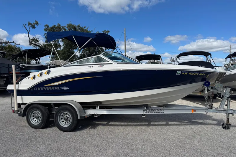 The Image of 2011 Chaparral 186 SSi boat on trailer under blue sky. - 0